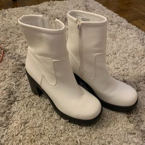 Heeled boots from Urban Outfitters. Brand new, worn once and indoors. Size 7.